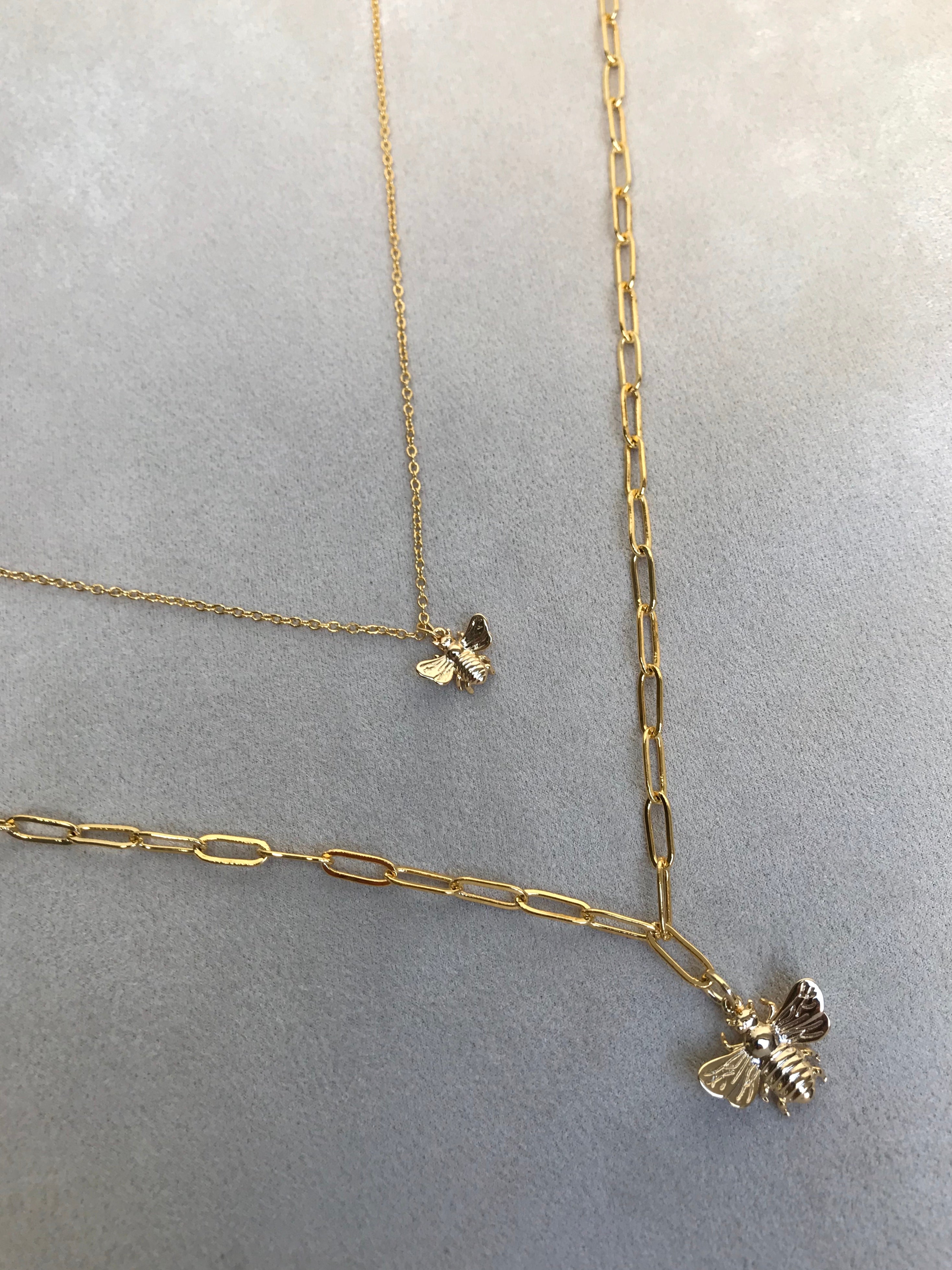 Small and big golden been necklace