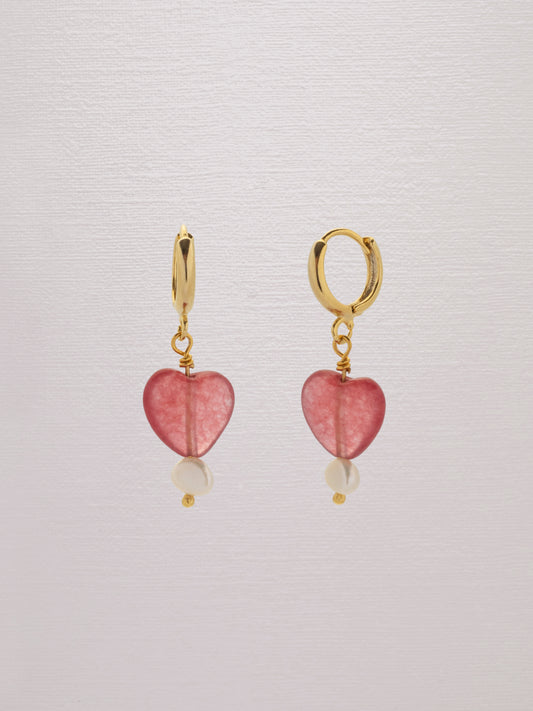 Red gemstone heart earring with a freshwater pearl and 24k gold-plated hoop.