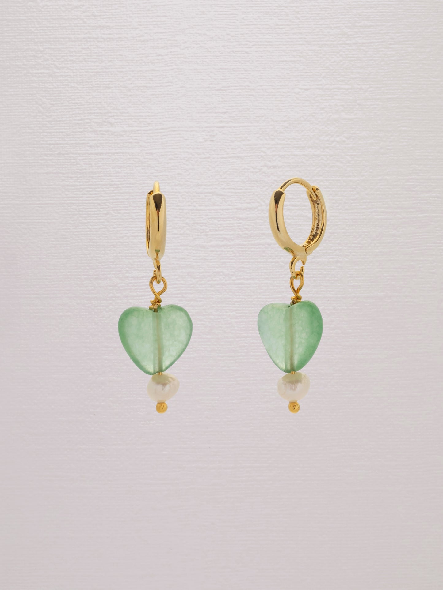 Light green gemstone heart earrings with a freshwater pearl and 24k gold-plated hoop.