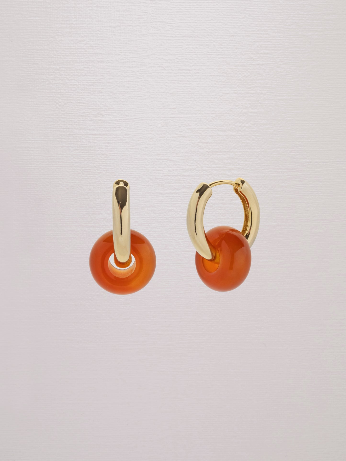 Donut bead carnelian gemstone hoop 24k gold-plated earrings.